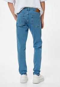 Koton MICHAEL - Vaqueros slim fit - blue denim