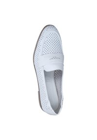 White perforated slip-on shoe with a rounded toe and elastic band. Flat rubber sole with light brown accents and a smooth, textured finish.