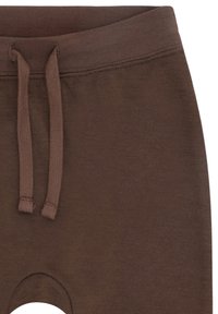 Pantaloni tricotati marroni con vita elastica e lacci coordinati, che mostrano la parte superiore e i dettagli delle cuciture.