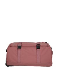 Borsa a tracolla in tessuto rosa tenue, con due cinghie regolabili, chiusura con zip e base piatta per stabilità. Design compatto e funzionale.