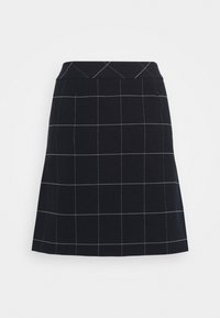 Jupe marine avec une taille ajustée et un motif à carreaux en gris clair. Fabriquée en tissu à la texture lisse. Silhouette en A.