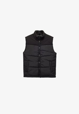 Chaleco negro acolchado con cuello alto, cremallera frontal y dos bolsillos laterales. Presenta paneles cosidos para aportar textura y aislamiento.