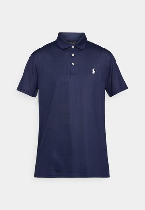 Mornarskoblue polo majica iz bombaža. Ima klasičen ovratnik, tri gumbe in majhen beli vezen logotip na prsih.