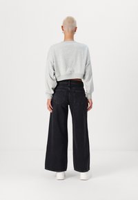 Vero Moda Petite VMREMY MR WIDE  - Wide Leg - black denim