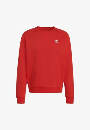 Sudadera roja con cuello redondo y puños acanalados. Presenta un pequeño logotipo blanco de Adidas en el pecho. Fabricada en suave material de algodón.