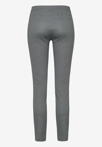 Pantalon ajusté gris et blanc texturé avec une taille élastique, montré de dos sur fond blanc uni.