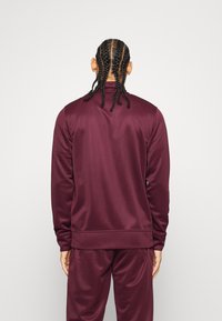 Jack & Jones Performance JCOZPOLY SUIT - Chándal - port royale