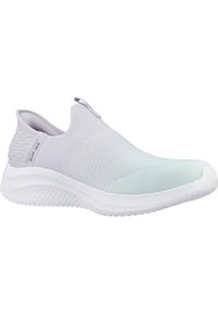 Zapato ligero tipo slip-on en un suave lavanda y verde, con una parte superior de punto texturizado, cuello elástico y suela blanca acolchada.