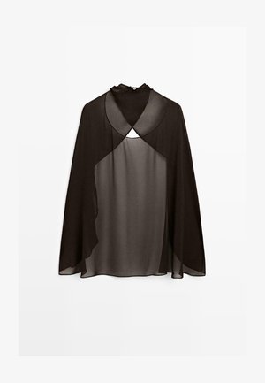 Blusa nera trasparente a maniche lunghe con collo alto e dettaglio incrociato sul petto, tessuto semi-trasparente, vestibilità ampia e chiusura con bottoni sul retro.