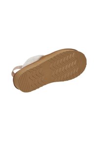 Schuhsohle mit Zickzack-Profilmuster, tannfarbenem Gummi-Material und einem weichen weißen Akzent am Fersenriemen.