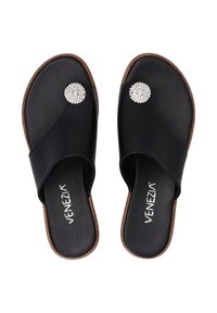 Sorte sandaler med kryds-design, som har en krystalaccent på remmen og en glat lædertekstur. Brun sål.