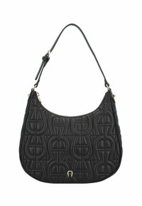 Borsa a spalla in pelle nera con design trapuntato, forma curva e tracolla lunga. Dotata di una zip in tono oro e un sottile dettaglio del logo.
