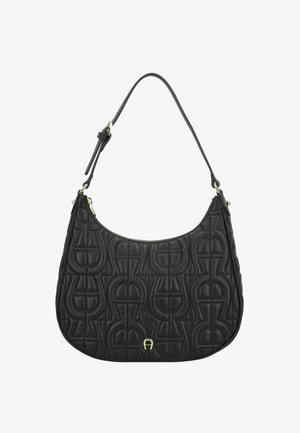 Zwarte leren schoudertas met een gestikt ontwerp, ronde vorm en een lange schouderband. Voorzien van een goudkleurige rits en een subtiele logodetail.