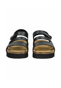Sandales noires avec trois sangles ajustables, une semelle en liège et une semelle extérieure en caoutchouc texturé. Design simple et fonctionnel pour le confort.