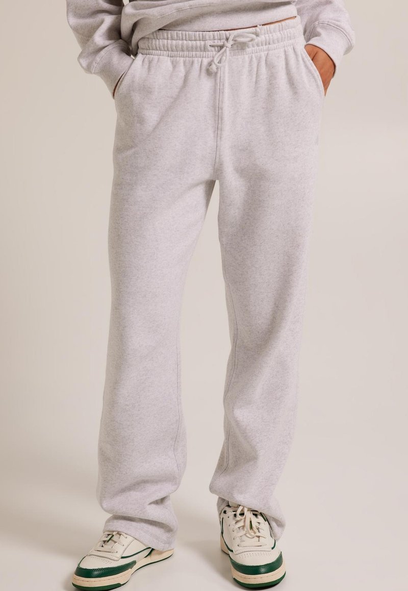America Today CARO Tracksuit bottoms light grey melange/light grey