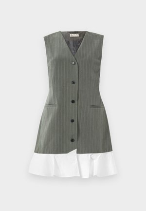 Sleeveless gray pinstripe dress with black buttons down front and white ruffled hem against plain background.