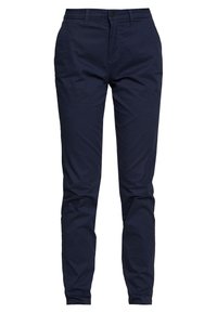 Námornícke modré nohavice z bavlny, so slim fit strihom, prednými vreckami a jediným gombíkom na zapínanie v páse. Hladká textúra.