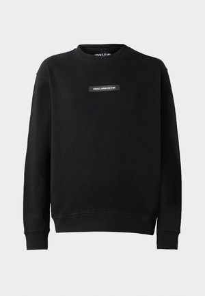 Black sweatshirt made of soft cotton blend, featuring a crew neck, long sleeves, and a rectangular logo patch centered on the chest.
