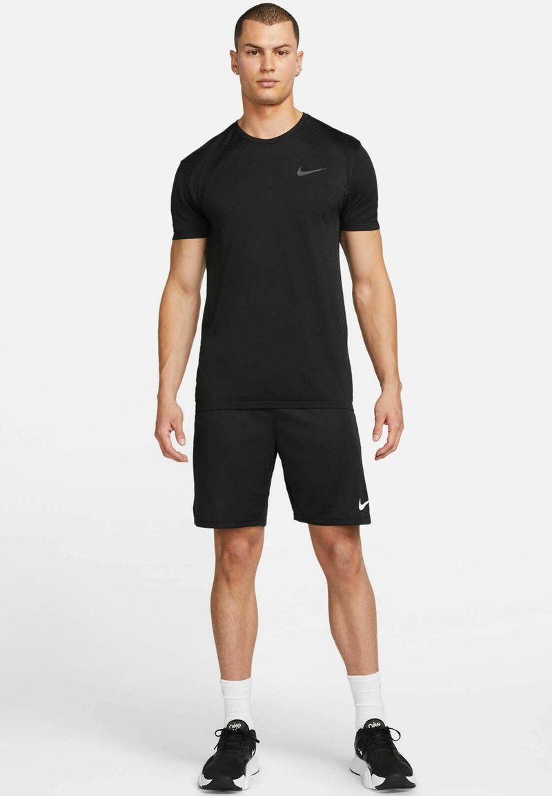 Herren Sportbekleidung | Nike Performance Sport T-shirt black dark smoke grey dark grey/schwarz - LA28947 Herren Sportbekleidung | Nike Performance Sport T-shirt black dark smoke grey dark grey/schwarz - LA28947
