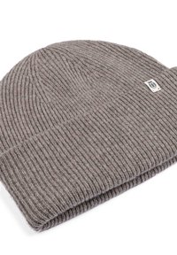 Gray knitted beanie made from soft wool, featuring a ribbed texture and a folded cuff. Includes a small, stitched logo patch.