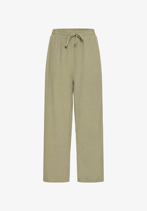 Světle zelené široké kalhoty vyrobené z měkké látky. Mají elastický pas se šňůrkou a hladký povrch. Bez kapes a vzorů.