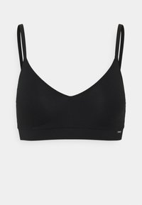 Soutien-gorge sans fil noir avec un décolleté en V profond, de fines bretelles réglables et un tissu lisse et extensible. Étiquette de marque discrète sur la bande latérale.