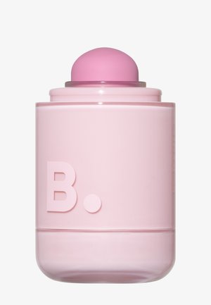Mat roze cilindrische container met afgeronde dop, aan de voorkant bedrukt met "B.", tegen een effen witte achtergrond.