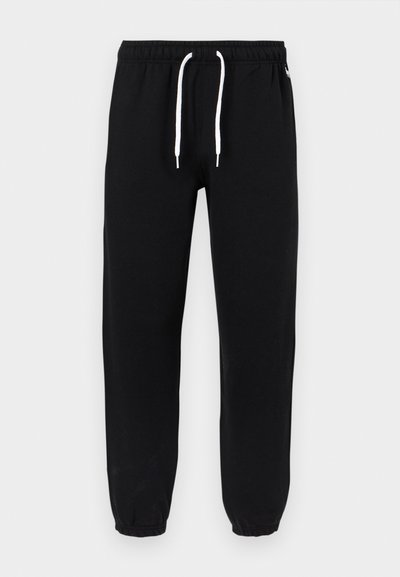 Μαύρο παντελόνι jogging με λευκό κορδόνι, ελαστική μέση και ελαστικές μανσέτες.