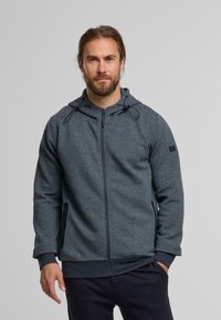 Grau strukturierte Zip-Hoodie mit Kapuze, verstellbaren Kordeln und Seitentaschen. Gerippte Bündchen und Saum.