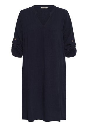 Locker sitzendes schwarzes langärmliges Kleid mit hochgekrempelten Ärmeln, die durch Knopfschlaufen gesichert sind, und einem V-Ausschnitt.