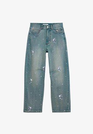 Niebieskie jeansy z denimu z kwiatowym haftem, małymi białymi kropkami, kieszenią na suwak z przodu po prawej stronie oraz klasycznym fasonem z pięcioma kieszeniami.