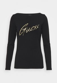 Långärmad svart t-shirt i mjukt material, med en guldig djurtryckslogotyp på framsidan och en båtlinning.