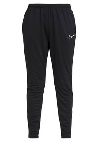 Schwarze Nike Sporthosen mit schmal zulaufenden Beinen, elastischem Bund, seitlichen Taschen und weißem Nike-Swoosh-Logo am rechten Oberschenkel.