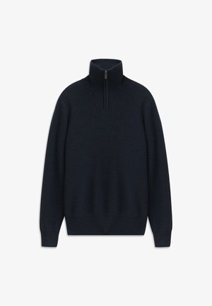 Marineblaue Zip-Up-Strickjacke aus strukturiertem Material mit hohem Kragen und gerippten Bündchen. Auffälliges quadratisches Musterdetail auf der Brust.