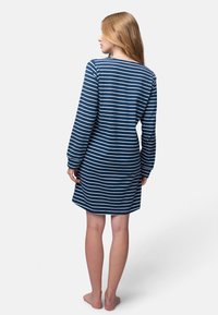Abito a maniche lunghe a righe blu navy e bianche con un taglio rilassato, realizzato in tessuto morbido, con scollo rotondo e orlo dritto.