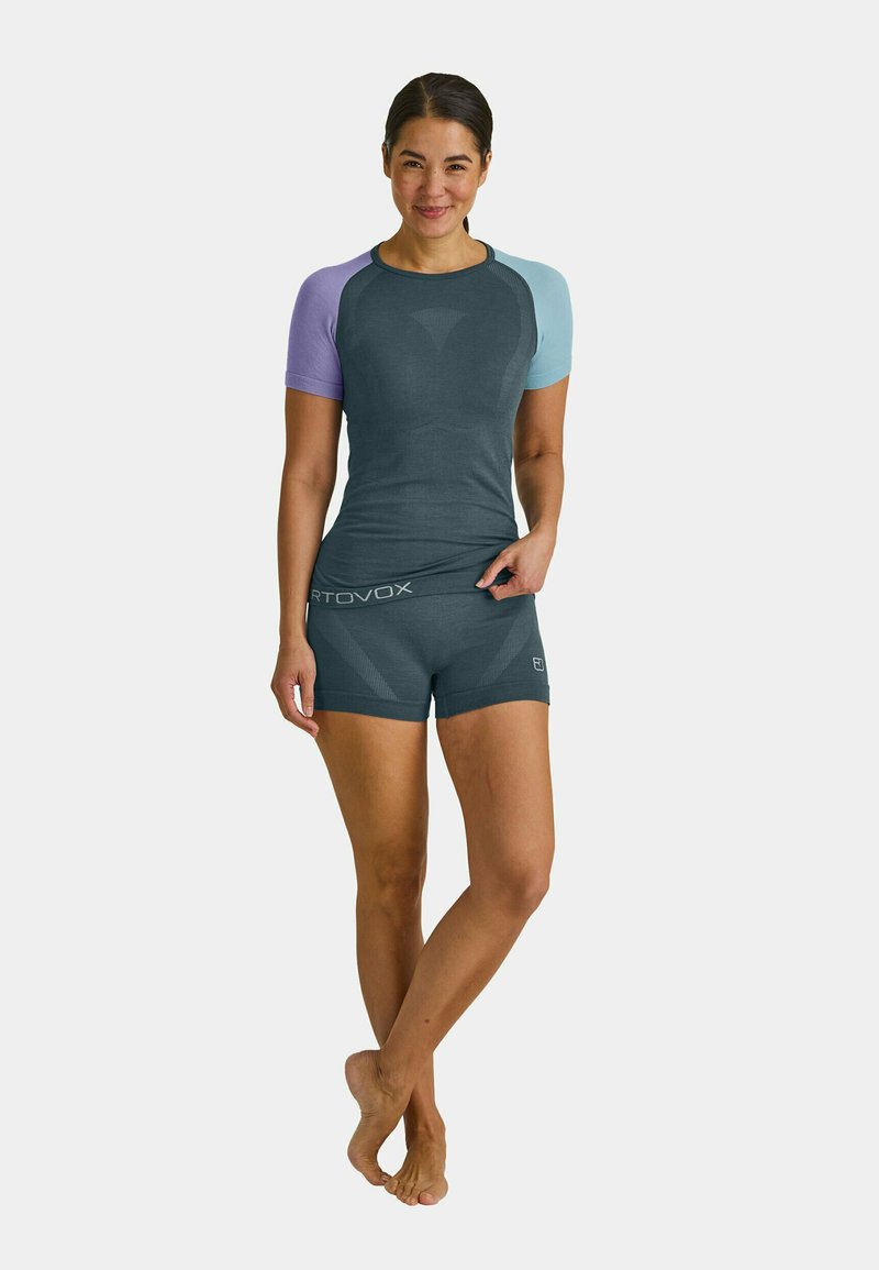 Gray activewear top with short sleeves in light purple and blue. Paired with matching gray shorts featuring subtle patterns.