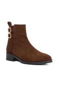 Brown suede ankle boot with a sleek design, featuring two gold buckles on the outer side and a low, black rubber heel.
