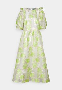 Lätt klänning i transparent tyg med ett blommönster i livfullt grönt och guld. Puffärmar och figursydd midja.