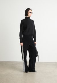 HUGO NARHYSAN - Joggebukse - black