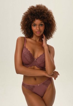 Mauve lace bra with floral patterns and adjustable straps, paired with a matching thong. Features delicate gold accents on both pieces.