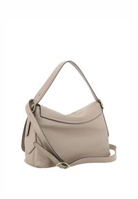 Beige leather handbag with a curved shape, featuring a short handle and a removable shoulder strap. Detailed with gold-tone hardware accents.