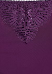 Purple fabric with a detailed lace design at the top featuring intricate, fan-like patterns and scalloped edges. Smooth texture overall.