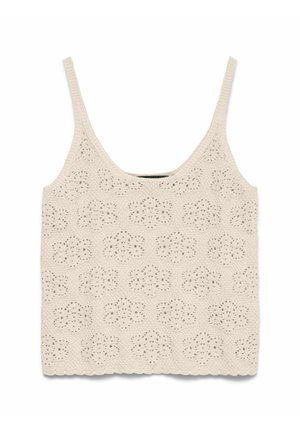 Débardeur en maille crochet couleur crème avec motifs floraux en œillets et fines bretelles, détail d'ourlet festonné.