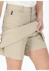 Light beige shorts made of a lightweight fabric, featuring a button and zipper closure, side pockets, and a relaxed fit.