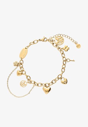 Gold charm bracelet with heart, key, clover, and circular logo charms, including an engraved rectangular tag reading "MAKE YOUR OWN LUCK."