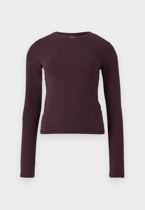 Ilga rankovė, apvaliu kaklu, tamsiai purpurinė, pagaminta iš minkšto, elastingo audinio. Yra prigludusi dizaino, be matomų raštų ar akcentų.