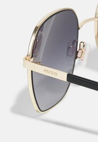 HUGO Solbriller - gold-coloured/black