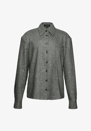 Šedá dlouhá halenka s dlouhým rukávem vyrobená z texturované vlněné tkaniny. Obsahuje špičatý límeček, přední knoflíky a kapsu na hrudi.