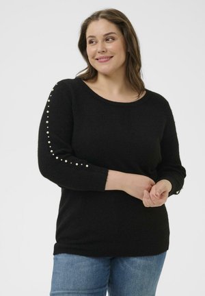Schwarzer Strickpullover mit rundem Ausschnitt, langen Ärmeln und perlenähnlichen Akzenten entlang des linken Arms, weiche Textur.
