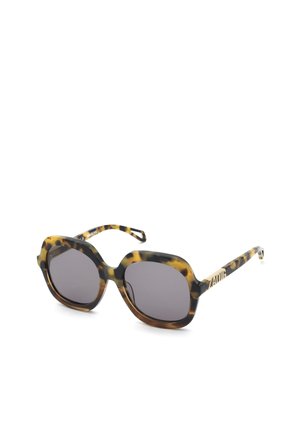 Lunettes de soleil carrées oversize à motif écaille, verres foncés et marquage doré sur les branches.